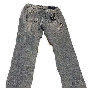 KSUBI women’s ripped jeans